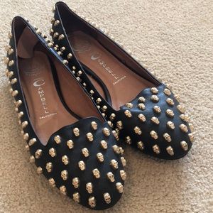 Jeffrey Campbell black flats with gold skull embellishments. Size 10